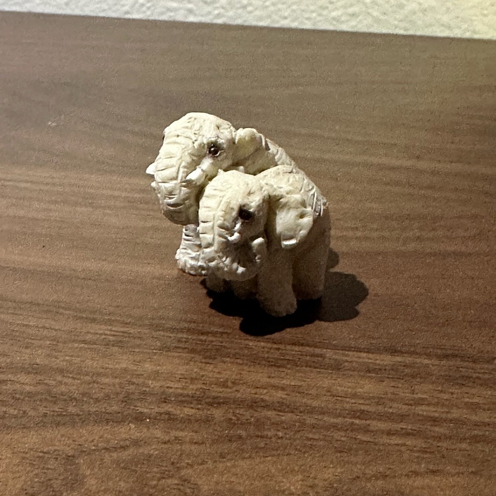 Vintage chalkware or plaster figurine of two elephants mom/baby elephants